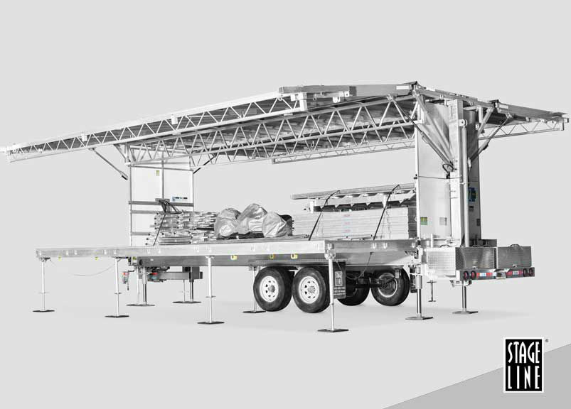 A mobile stage setup for events, showcasing a versatile design. Neves Media in Panama City, FL, offers event solutions and staging services.